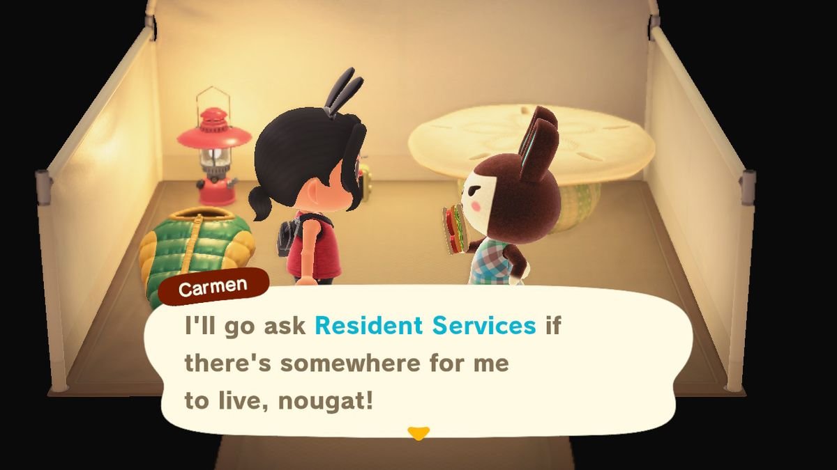 Carmen talks about moving in in Animal Crossing. She’s in a tent and holding a sandwich.